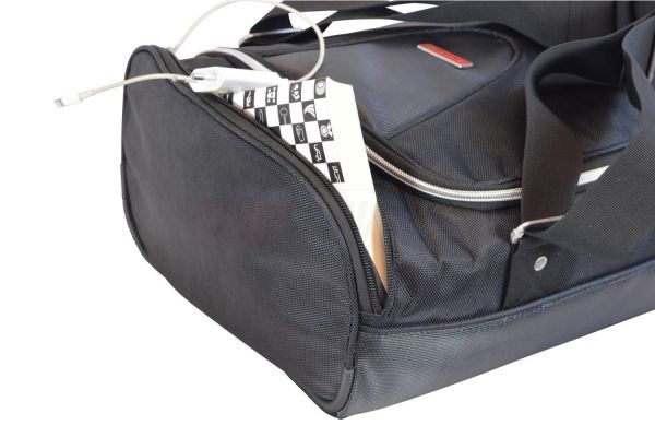 Un sac de voyage à roulettes en cuir pour voyager efficacement